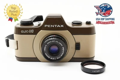 [CASI COMO NUEVA] Cámara fotográfica Pentax Auto 110 Granate Safari SLR 24 mm F/2,8 JAPÓN Foto 1 de 4