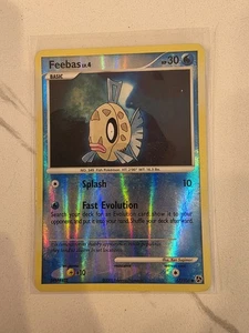 1x Feebas - 67/106 - Commune - Carte Pokemon Holo Inversée - Diamant et Perle - Neuf sous blister - Photo 1/2