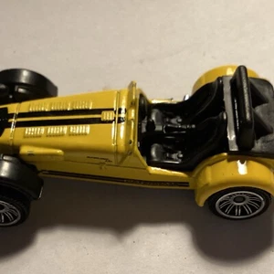 Matchbox MBX Sports Cars Caterham R500 Superlight Roadster Yellow/Black Stripes - Picture 1 of 9