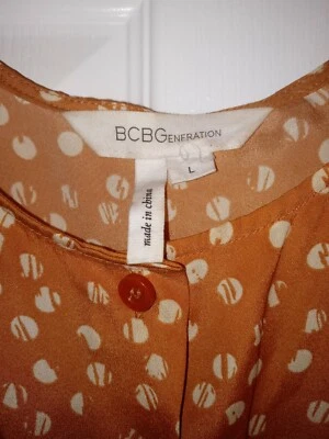 Maxi Vestido de Fiesta BCBGENERATION Para Mujer Naranja y Beige Lunares Bajo Grande Foto 1 de 4