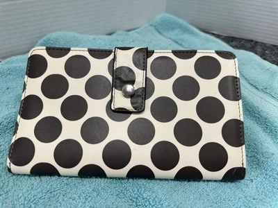 Cartera a lunares blanca y negra marca Mundi  Foto 1 de 4