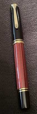 PELIKAN SOUVERAN R600 Black & Burgundy Rollerball Pen With Gold Trim-Blue Ink. - Image 1 of 4