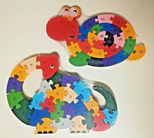 Rompecabezas de madera con números de dinosaurio y caracol letras brillantes coloridos ABC lote sellado 2 - Imagen 1 de 4