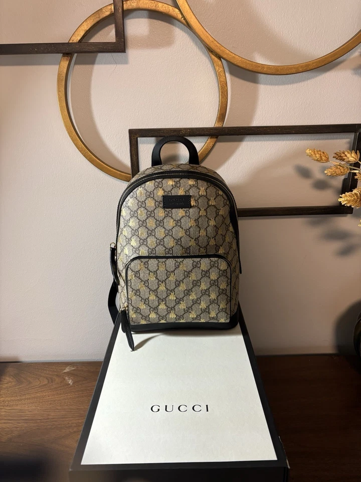 Mochila Gucci GG Supreme pequena bege/preto lona/couro - Imagem 1 de 4