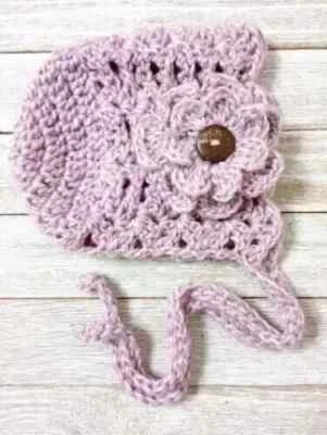 ganchillo hecho a mano bebé flor sombrero gorro recién nacido 0/3 brillo malva nuevo Foto 1 de 2