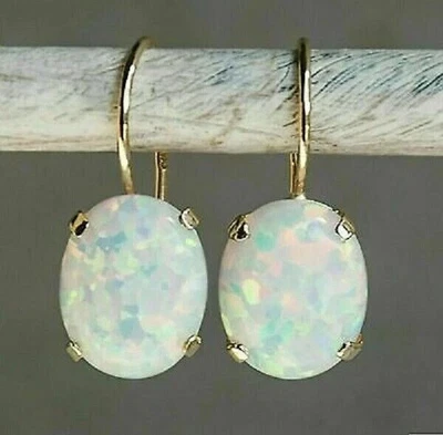 Hermosos aretes colgantes/gotas de ópalo de fuego natural de 4,50 quilates de corte ovalado enchapados en oro de 14K Foto 1 de 4