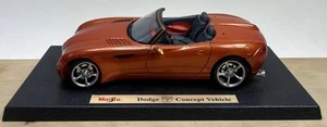 MAISTO DIECAST CAR DODGE CONCEPT CONVERTIBLE NARANJA ESCALA 1/18 SIN CAJA - Imagen 1 de 10