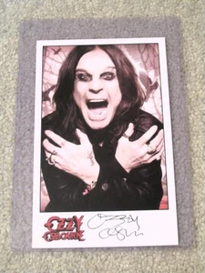 OZZY OSBOURNE AUTOGRAPH 5X8 PHOTO WITH PLASTIC HOLDER - Picture 1 of 2
