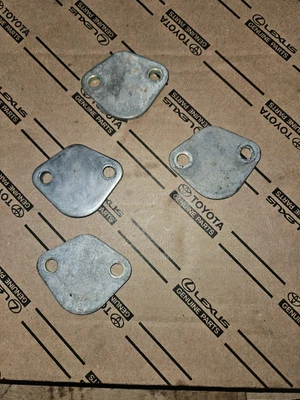 Placa de bloqueo de combustible OEM GENUINA TOYOTA PICKUP 4RUNNER CELICA 20R 22RE usada  Foto 1 de 2