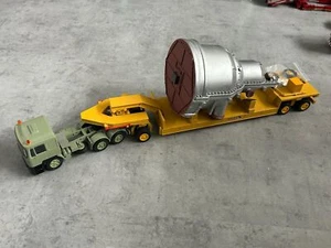 Conrad 1:50 MAN 6x4 + rimorchio Schmitz lowloader + carrello +... - Foto 1 di 6