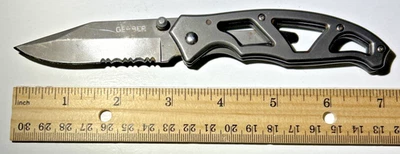 Gerber Paraframe I Folding Pocket Knife, TI-Grey, Serrated Edge, USED - Fair - Image 1 of 4