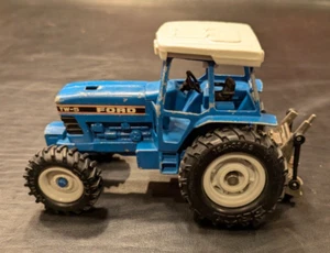 ☑️ Vintage 1: 32 Scale Blue Ford TW-5 Die-Cast + Plastic Tractor with 3pt Hitch - Picture 1 of 14