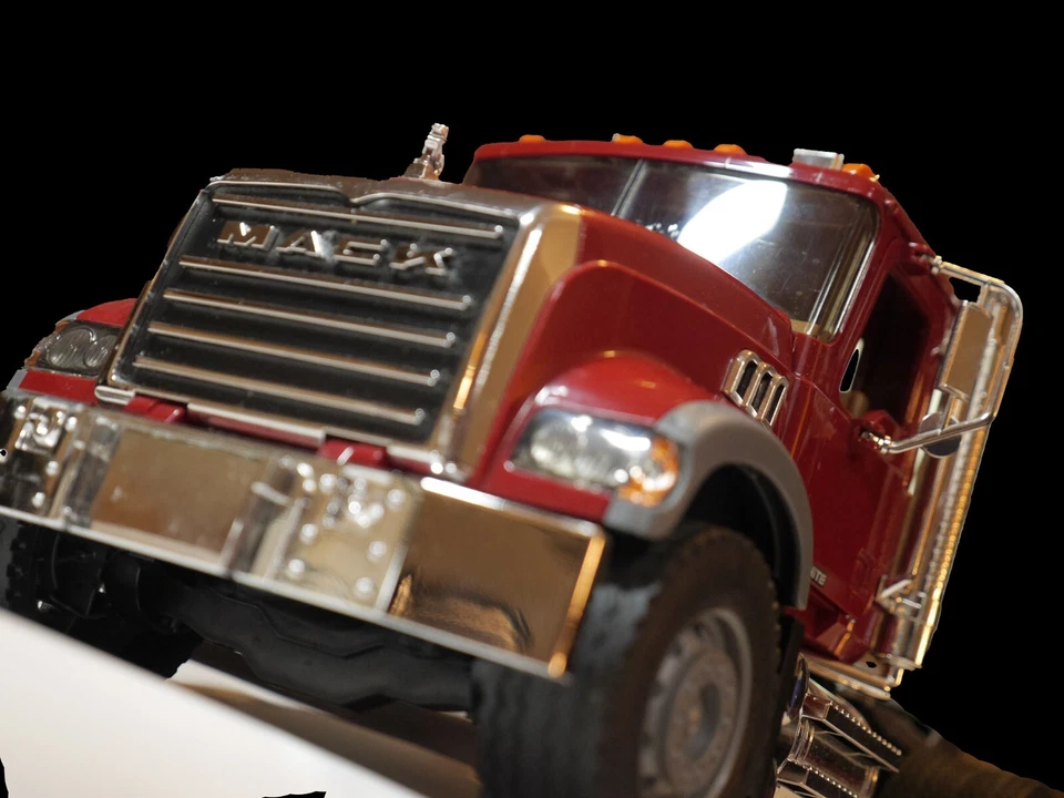 Bruder Mack Tandem Axle Tractor With Lowboy Flatbed Trailer - Image 1 of 4