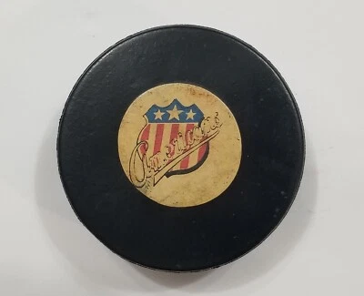 Disco de juego de hockey vintage años 70 ROCHESTER AMERICANS Art Ross Converse AHL Foto 1 de 3