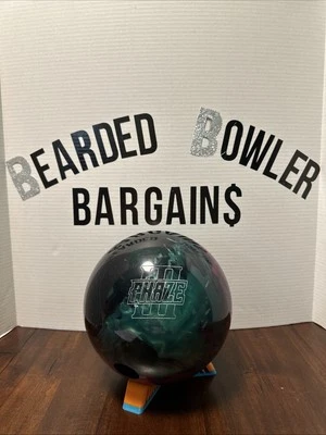 Bola de boliche Storm Phaze III 14 lb en obsidiana/jade/orquídea perforada para un IT Foto 1 de 4