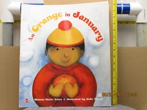 For sale is: An Orange in January (Paperback) by Dianna Hutts Aston (2014) - Picture 1 of 5
