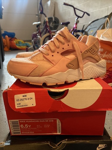 NIKE Huaraches rosa gioventù