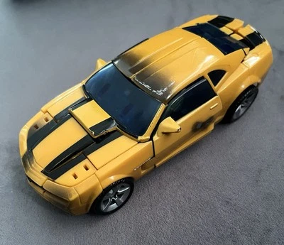 2006 Takara Hasbro Plastic Camaro Transformers Robot 5 1/2" Long - Image 1 of 4