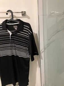 Greg Norman Tasso Elba polo golf nera uomo adulto Medium NUOVA - Foto 1 di 3