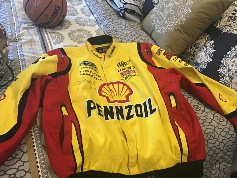 Autographed Kurt Busch Nascar Penzoil yellow Jacket - Image 1 of 4