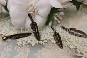 5pz CIONDOLO CHARM a forma di PIUMA color bronzo 3,5x0,8cm creare bigiotteria - Picture 1 of 1