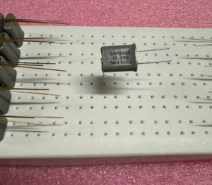 SARONIX 12.288MHz Crystal SRX6007L 3 LEADS NEW - Picture 1 of 3