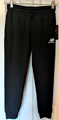 Pantalones deportivos New Balance con bolsillos laterales talla M 10-12 negros nuevos con etiquetas Foto 1 de 3