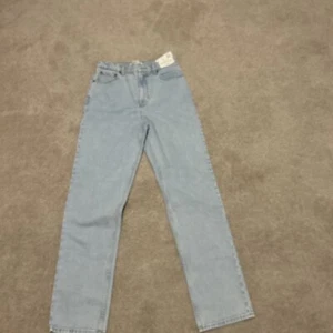 Ultra high-rise jeans - Picture 1 of 14