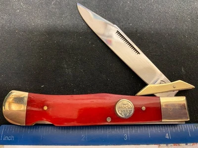 Buck Creek Swing Guard 猎豹锁背刀,光滑红色骨柄 — 第 1/4 张图片