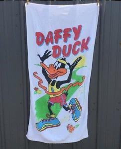 "Toalla de playa de colección Looney Tunes Pato Lucas 1985 ganador de la carrera 25x50"" Warner Bros" - Imagen 1 de 12