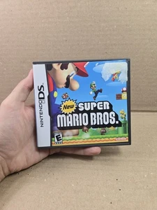 New Super Mario Bros. (Nintendo DS 2006) Complete w/Manual Used Condition Tested - Picture 1 of 11