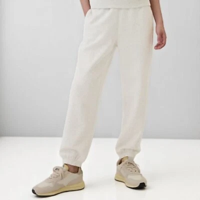 Joggers para mujer Gap puños elásticos/cintura polar gris pálido calor Foto 1 de 2