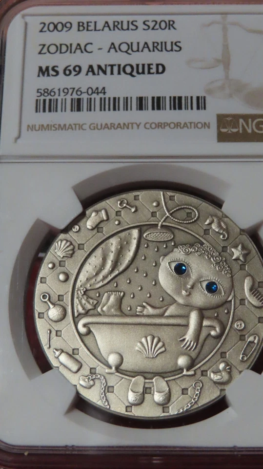 Moneda de plata Ojos de Swarovski de 1 oz signos del zodiaco de Bielorrusia Acuario NGC PCGS MS69 1 oz .999 Foto 1 de 4