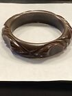 VTG. CHOCOLATE BROWN DEEPLY HAND CARVED HIGH RELIEF THUMB PRINT BANGLE BRACELET