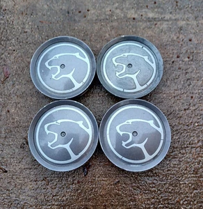 Mercury Cougar center cap set of 4, 1998-2002 part number 98BG 1000 BA - Picture 1 of 3