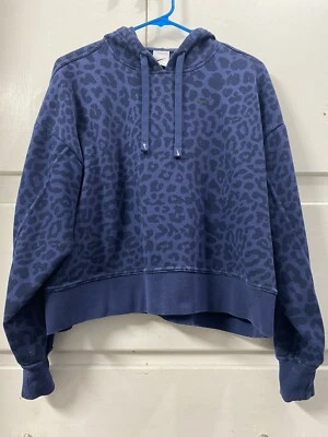 Sudadera corta con capucha Nike Dri-Fit Get Fit estampado animal leopardo para mujer talla mediana Foto 1 de 4