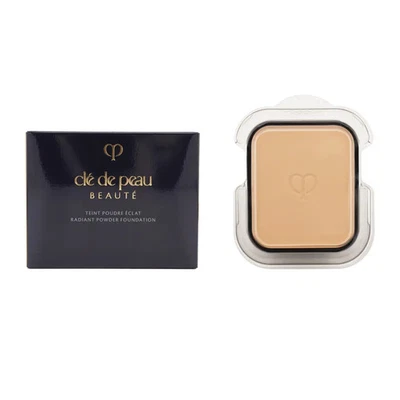 Base en polvo Clé de Peau Beauté Tampudre Eclat Ocher 00 8 g recarga FPS25 Foto 1 de 4