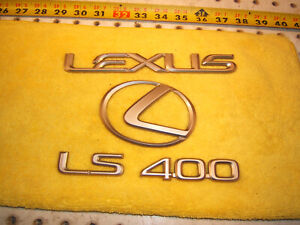Lexus 1997 LS400 Coach edition PLATINUM rear deck lid plastic OEM 3 Emblems only