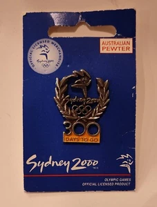 Pin oficial de los Juegos Olímpicos de Sydney 2000 90 días para ir Aminco peltre australiano en efectivo - Imagen 1 de 2