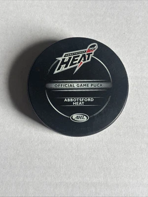 2010-11 Sherwood Abbotsford Heat AHL 75th Anniversary Official Game Puck - Image 1 of 2