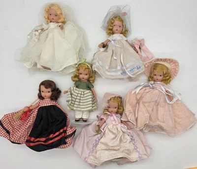 Nancy Ann Storybook Dolls Lot Of 6 Bisque Frozen Legs Painted Eyes W/Doll Stands - Image 1 of 4