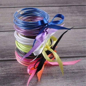 Mehrlagige Sommer Schleife Glitzer Armreifen Gefüllt Silikon Gelee Armbänder Set - Bild 1 von 24