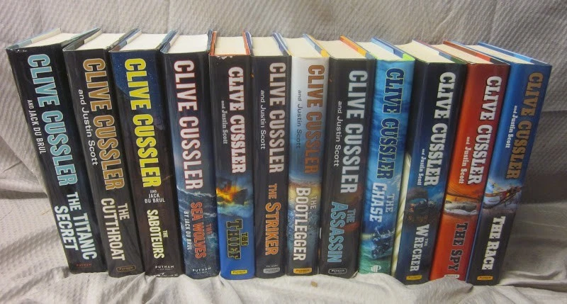 Lot of 12 Clive Cussler Novels Hardcover Books - Isaac Bell Series - Image 1 of 4