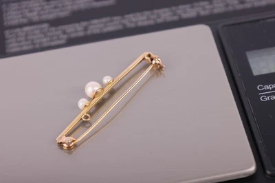 Broche de barra de perlas de oro de 9 quilates (1,89 g) Foto 1 de 4