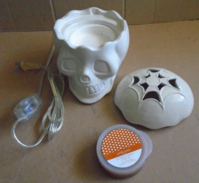 Calentador de cañón dorado vela aroma cápsula cera decoración de Halloween calavera de cerámica Foto 1 de 4
