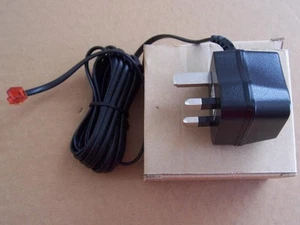 Unused BT SGW-09UK-06 Power Supply AC/DC Adaptor Charger Black Output 9vdc 100mA - Zdjęcie 1 z 2