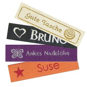 Namensbänder Stoffetiketten glitzernd mit Text + Symbol zum Aufnähen 100 Stück - Bild 1 von 20