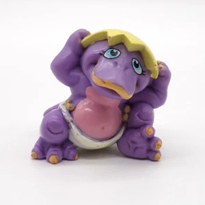 Pañal mágico Galoob de colección púrpura bebé dinosaurio PVC figura 2" 1992 juguete - Imagen 1 de 10
