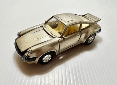 Porsche 911 TT-102 PullBack Action Works 1:38 Hood/Doors Open Rubber Tires - Image 1 of 4