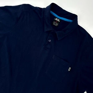 Oakley Polo Shirt Mens Medium Blue Stretch Pocket Short Sleeve Golf Performance - Picture 1 of 6
